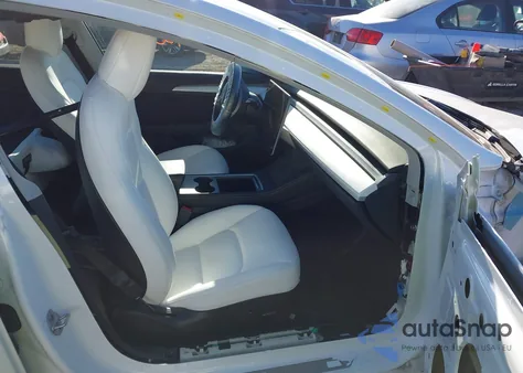 2021 Tesla Model 3 Standard Range Plus Rear-Wheel Drive from USA, damaged, VIN 5YJ3E1EA4MF029434